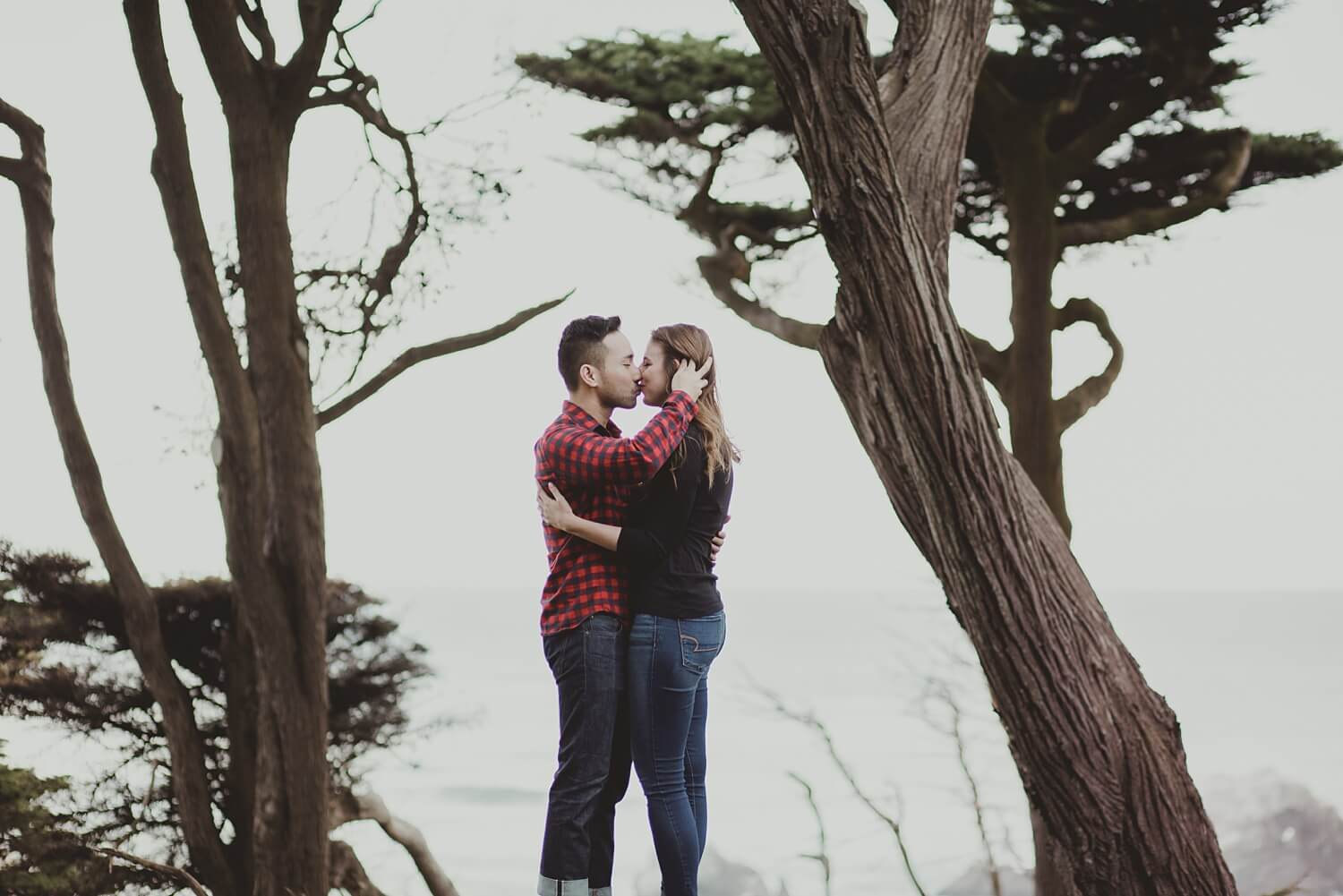 san francisco lands end sutro baths presidio baker beach rocks trees forest natural candid lifestyle engagement session engagement photos with dog